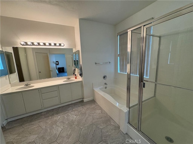 bathroom with plus walk in shower and vanity