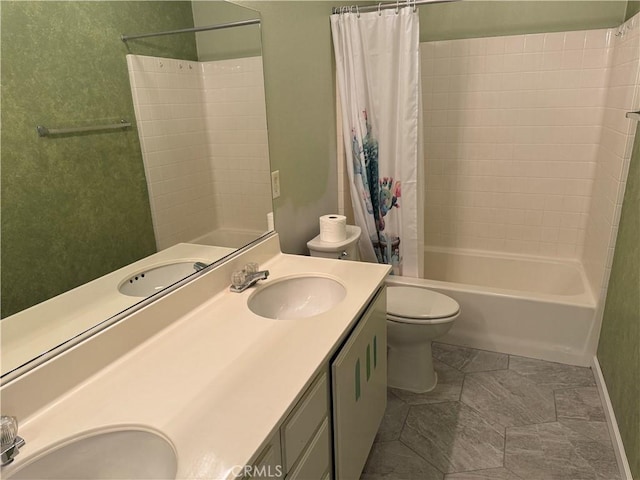 full bathroom with vanity, toilet, and shower / bath combo with shower curtain