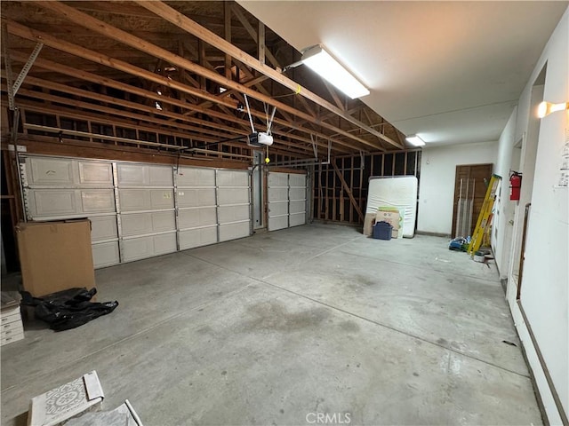 garage featuring a garage door opener