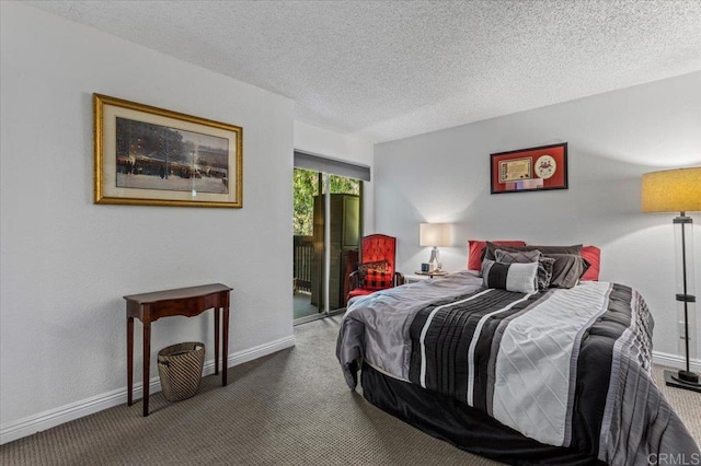 bedroom with a textured ceiling, carpet flooring, and access to outside