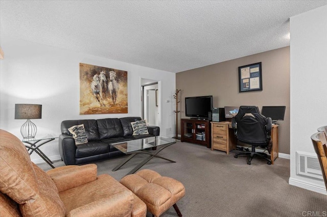 carpeted living room featuring a textured ceiling