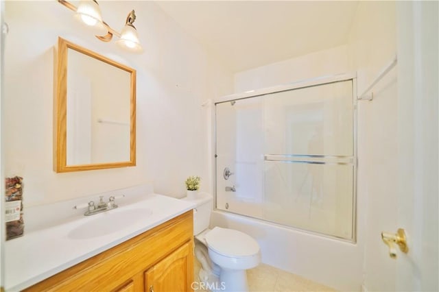 full bathroom with tile patterned flooring, vanity, toilet, and shower / bath combination with glass door