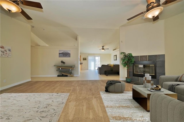 living room featuring wood-type flooring and lofted ceiling