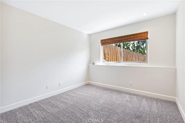 view of carpeted spare room