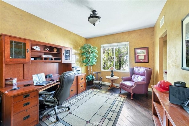 home office featuring dark hardwood / wood-style flooring