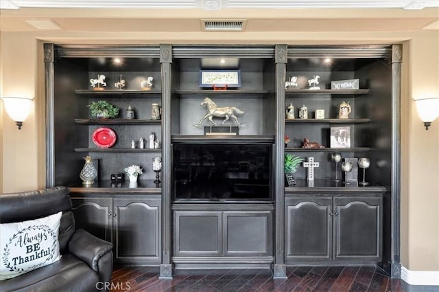 bar with dark hardwood / wood-style floors