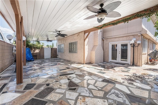 view of patio featuring ceiling fan and french doors