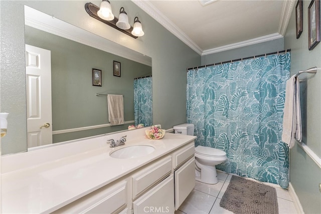 bathroom with tile patterned floors, toilet, vanity, and ornamental molding