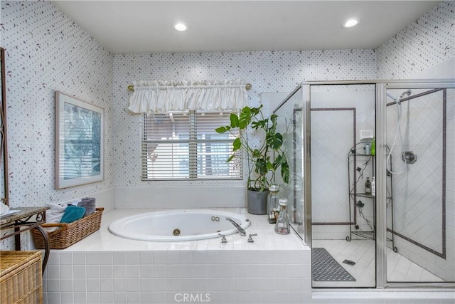 bathroom with shower with separate bathtub