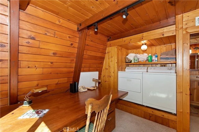 laundry room with washer and dryer, wooden walls, carpet floors, rail lighting, and wood ceiling