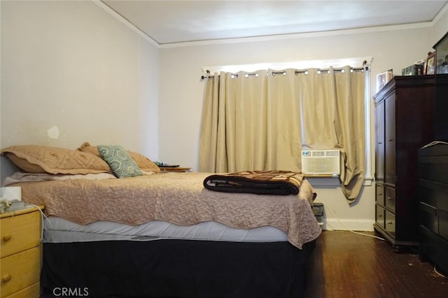 bedroom featuring crown molding, dark hardwood / wood-style floors, and cooling unit