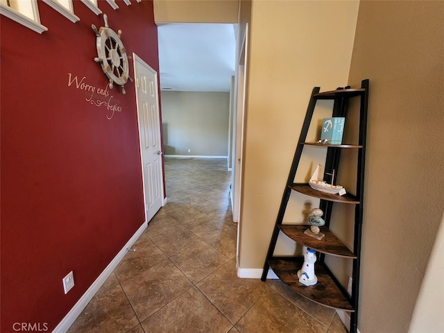 corridor with tile patterned flooring