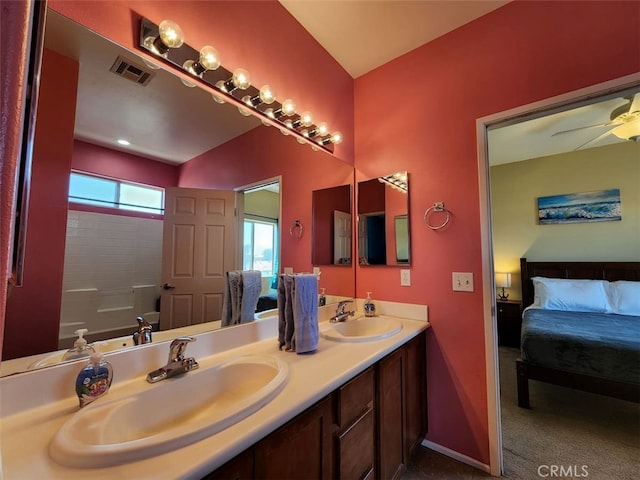 bathroom featuring vanity and ceiling fan