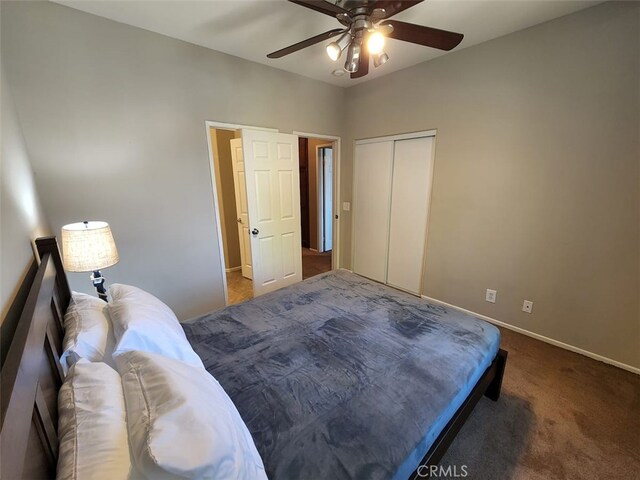 bedroom featuring ceiling fan, carpet floors, and a closet