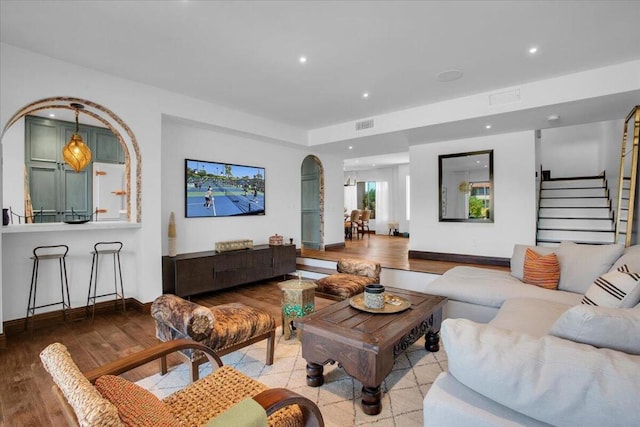 living room with light hardwood / wood-style floors