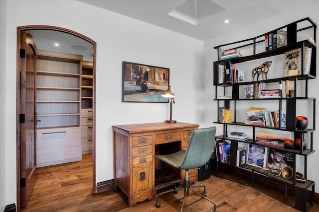 office space with hardwood / wood-style flooring