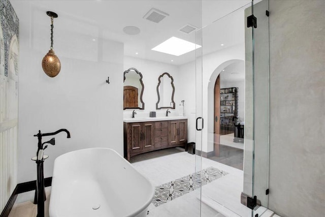 bathroom with vanity and plus walk in shower