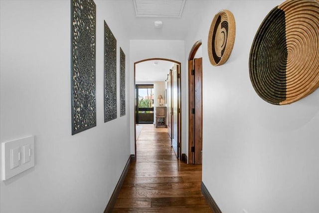 hallway featuring dark hardwood / wood-style floors