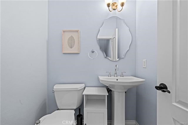 bathroom featuring toilet