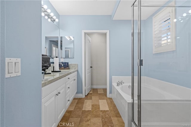 bathroom with vanity and plus walk in shower