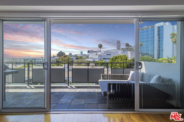 view of balcony at dusk