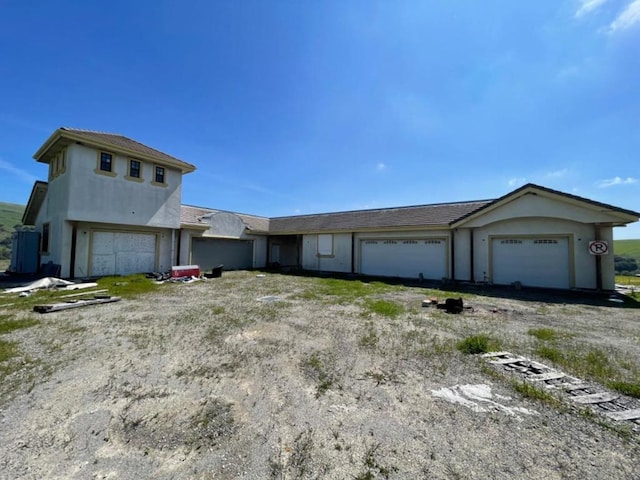 view of home's exterior with a garage