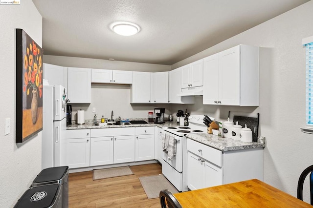 kitchen featuring light hardwood / wood-style flooring, sink, white appliances, and white cabinetry