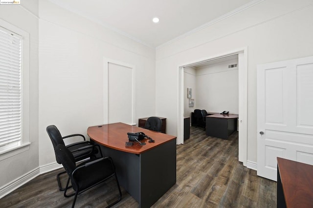 office area with dark wood-type flooring and ornamental molding