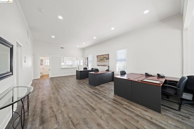 office space featuring crown molding and hardwood / wood-style floors