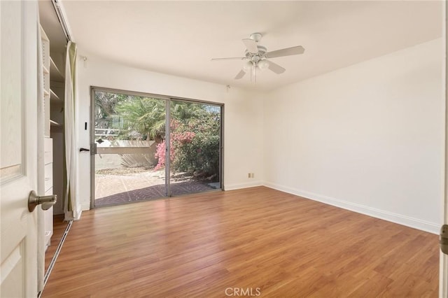 unfurnished room with ceiling fan and light hardwood / wood-style flooring