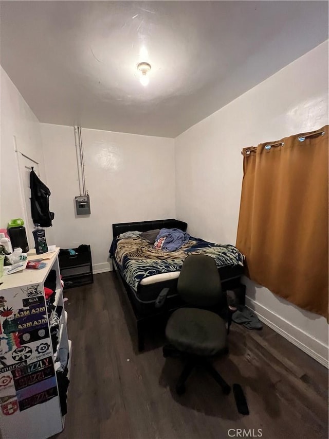 bedroom featuring dark hardwood / wood-style floors