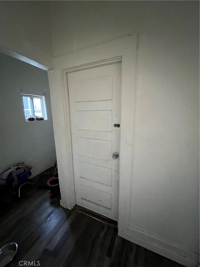 interior space with dark wood-type flooring