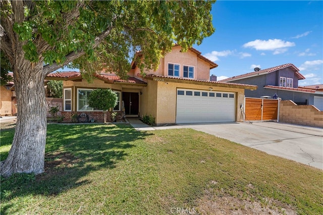 view of front of property featuring a front yard and a garage