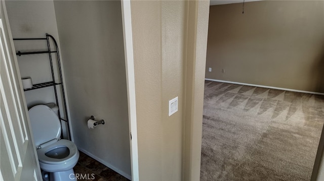 bathroom featuring toilet