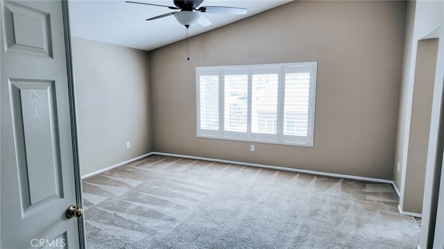 unfurnished bedroom with lofted ceiling, ceiling fan, and light colored carpet