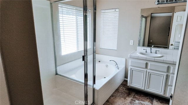 bathroom featuring independent shower and bath and vanity