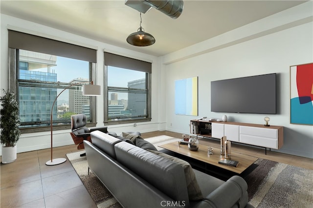 living room with light tile patterned floors