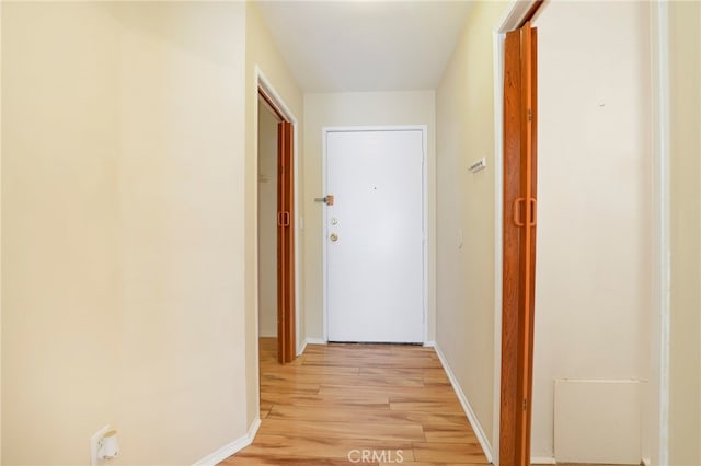 hallway featuring light hardwood / wood-style floors