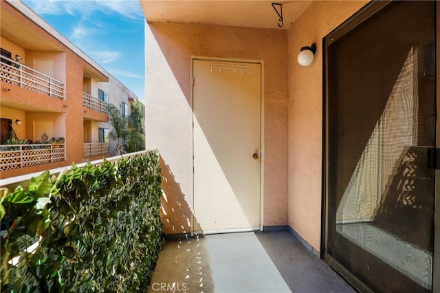 doorway to property with a balcony