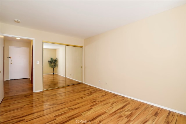 unfurnished room featuring light hardwood / wood-style floors