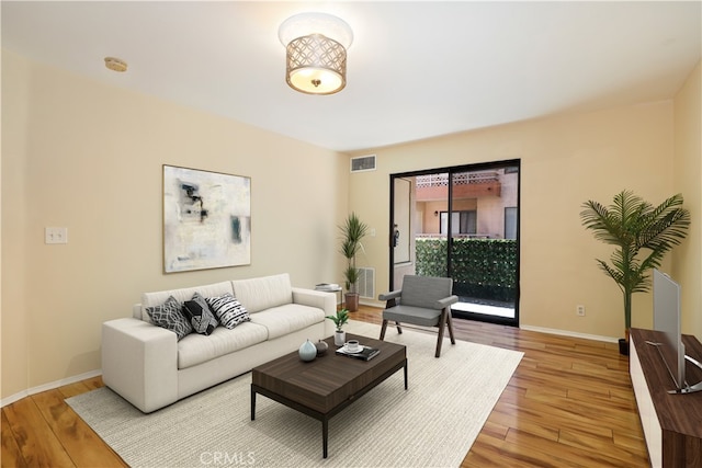 living room with hardwood / wood-style floors