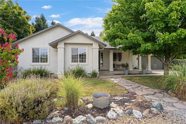 ranch-style house featuring a garage