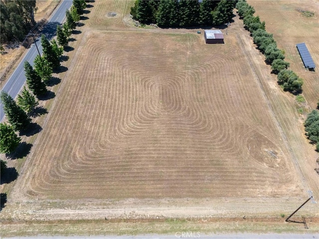 birds eye view of property featuring a rural view