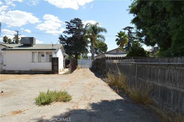 view of yard with central AC unit