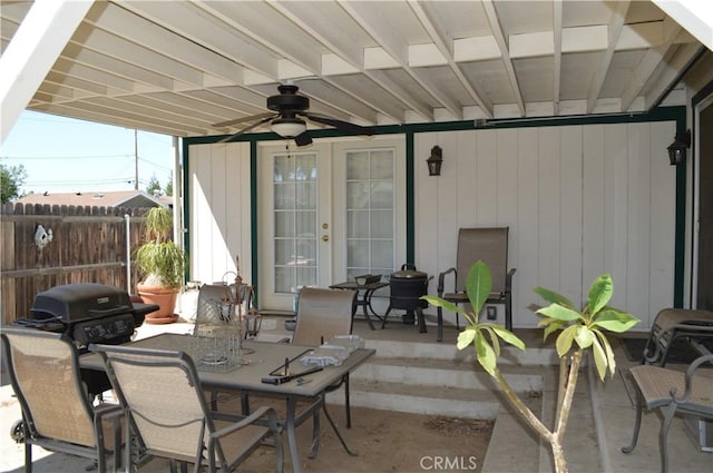 view of patio / terrace featuring a grill and french doors