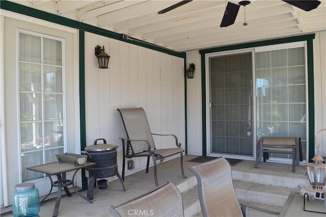 view of patio featuring ceiling fan