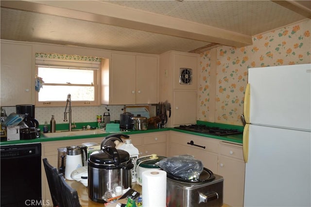 kitchen featuring dishwasher, white cabinets, sink, white fridge, and stainless steel gas cooktop