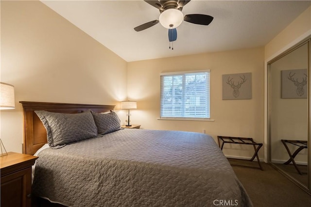 carpeted bedroom featuring ceiling fan and lofted ceiling