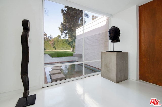 doorway with concrete flooring