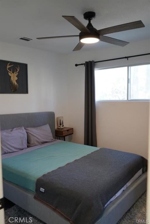 bedroom with carpet and ceiling fan